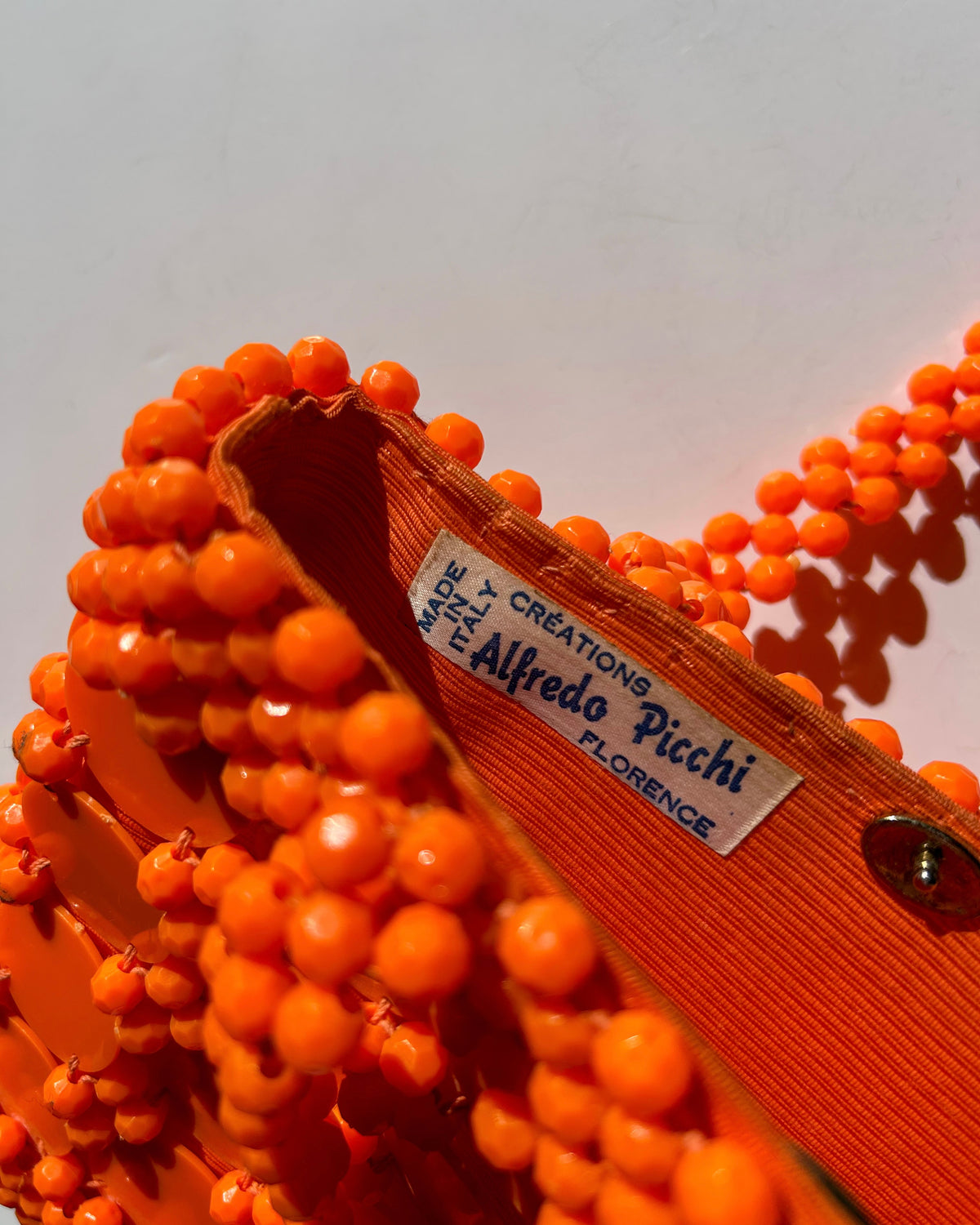 TANGERINE HANDBAG